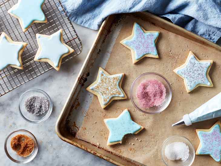 Decorated cookies on baking sheet.