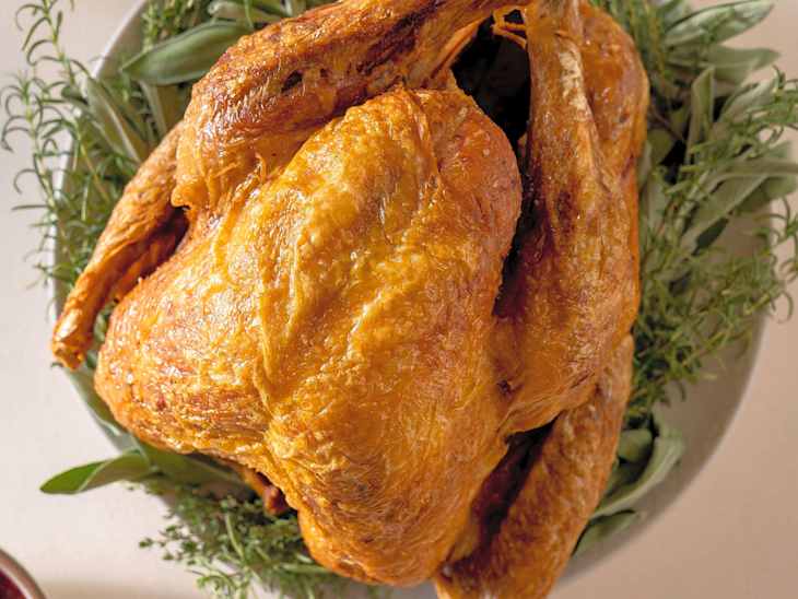 Whole deep fried turkey served on platter.