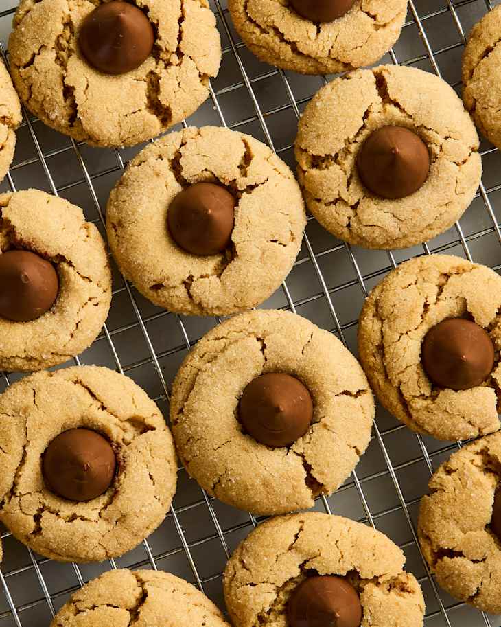 overhead shot of peanut butter blossoms on a cooling rack