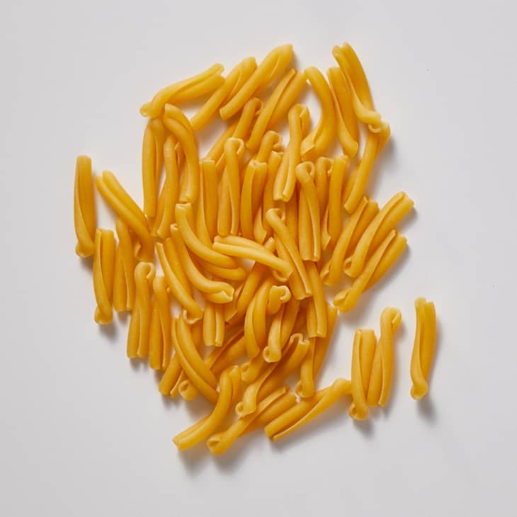 Caserecce on a white surface.