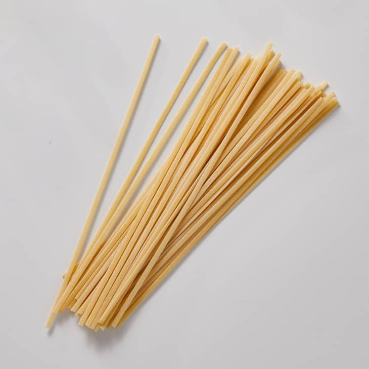 linguine on a white surface