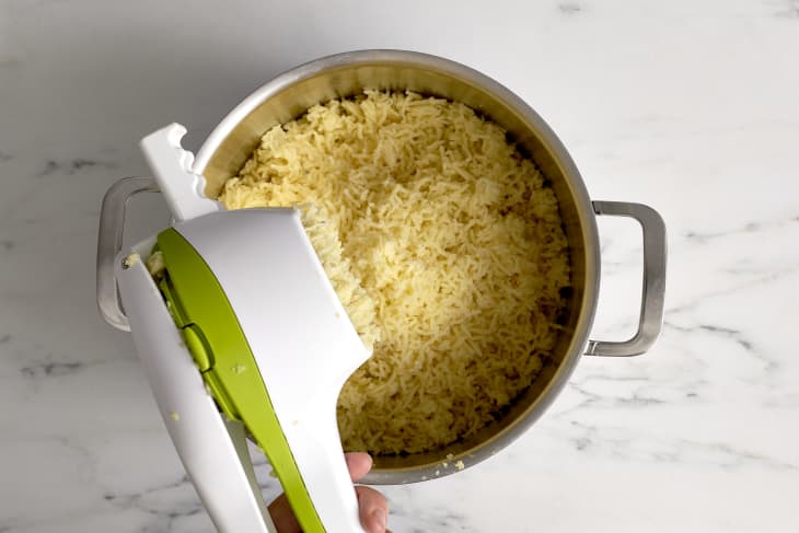 Using a potato ricer to make mashed potatoes