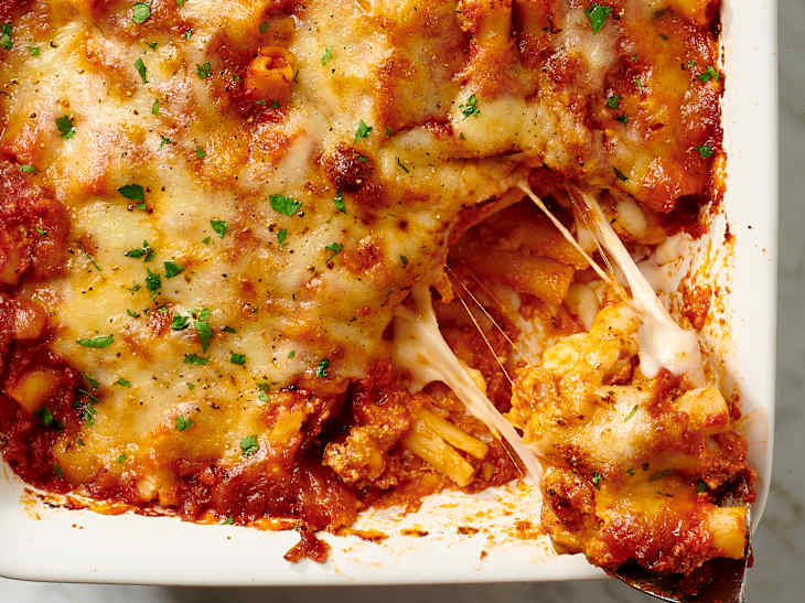 photo of baked ziti in a white casserole dish
