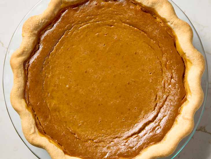 overhead shot of a whole pumpkin pie