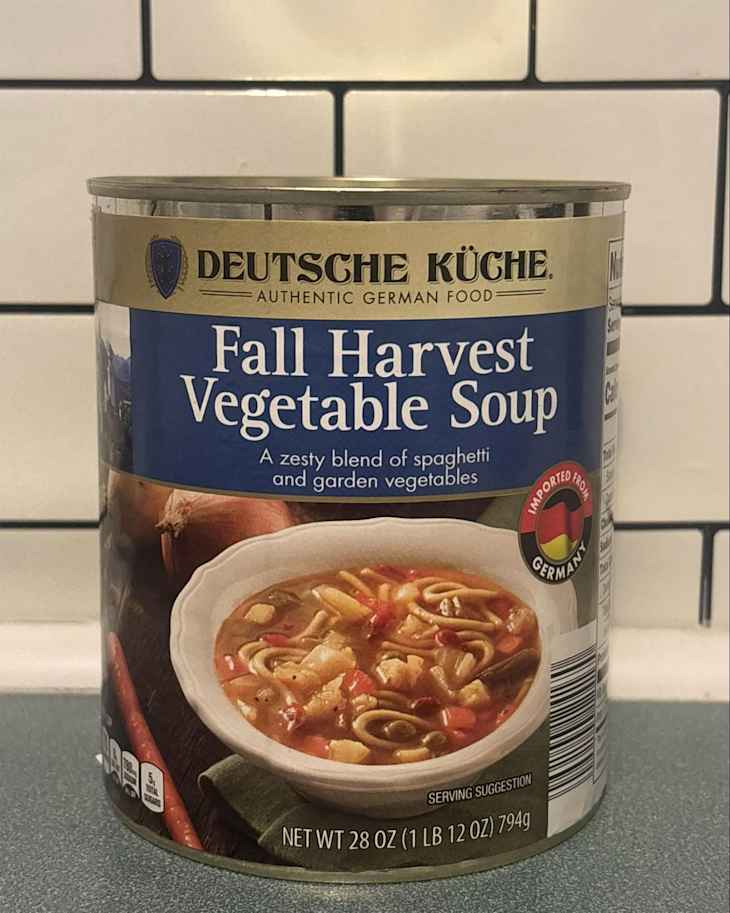 Can of Deutsche Kuche Fall Harvest Vegetable Soup on countertop.