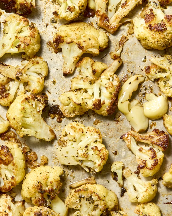 overhead shot of roasted cauliflower on a sheet pan.