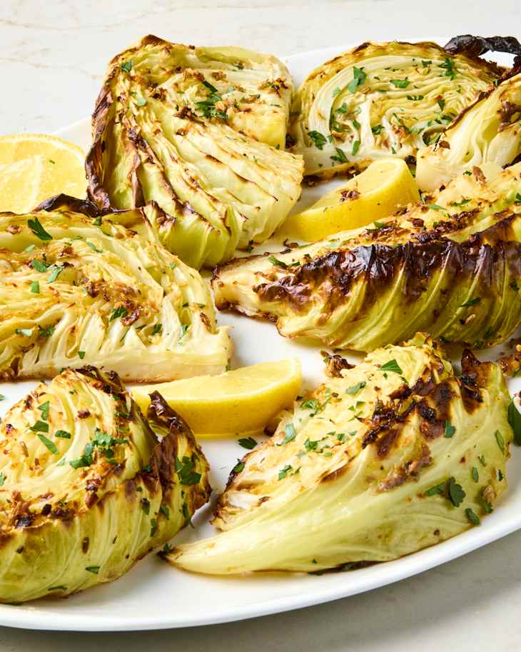 Roasted cabbage wedges on a platter