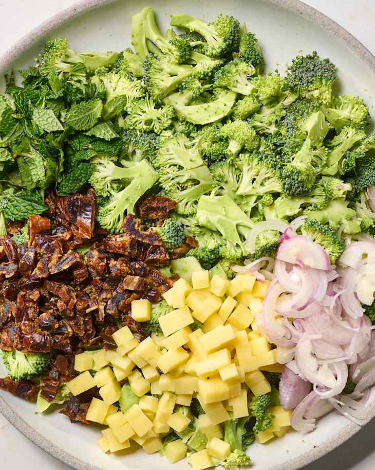 Components of chopped broccoli salad in a bowl