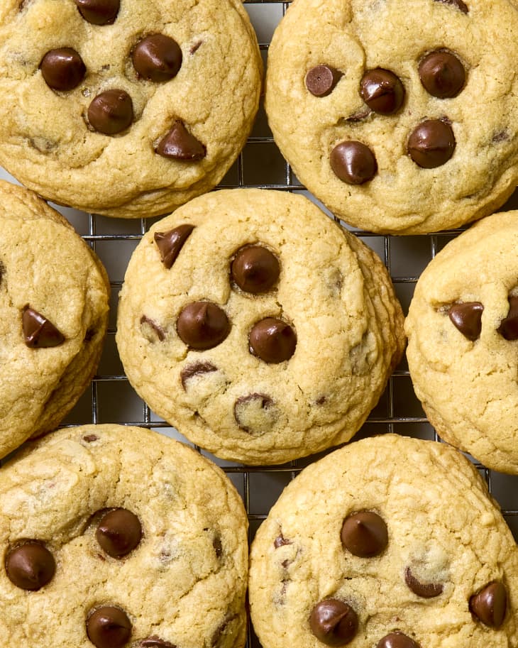 overhead shot of soft chocolate chip cookies on a cooling rack.