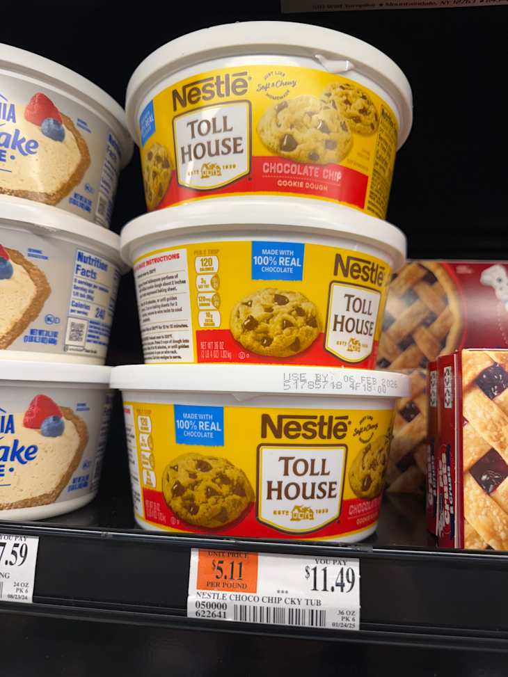 Tubs of Toll House cookie dough on a shelf
